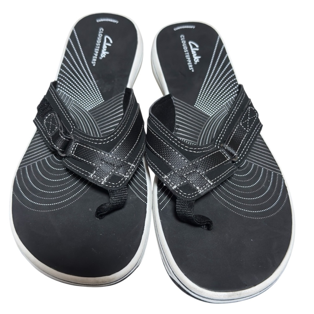 Clarks Black and White Women’s Flip-Flops
Breeze Sea  flip-flop Sz 12 New no box